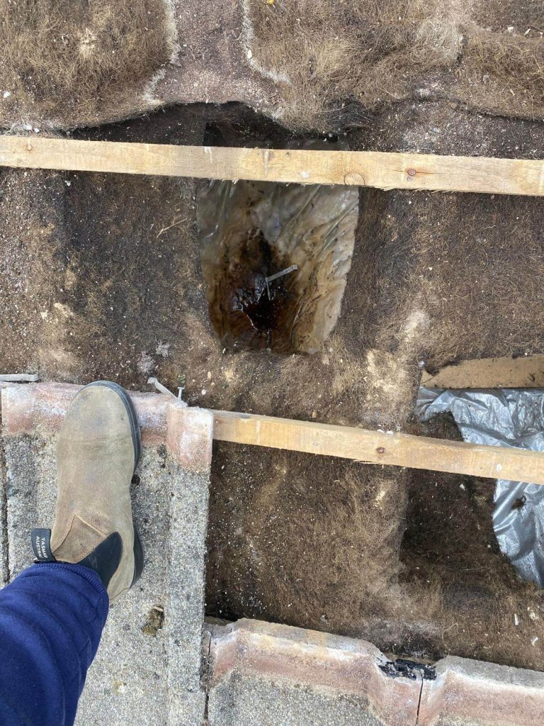 hole in roof on a house