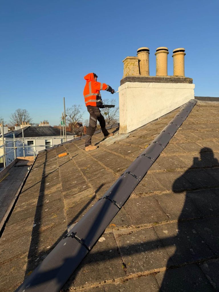 repairing a chimney on a house