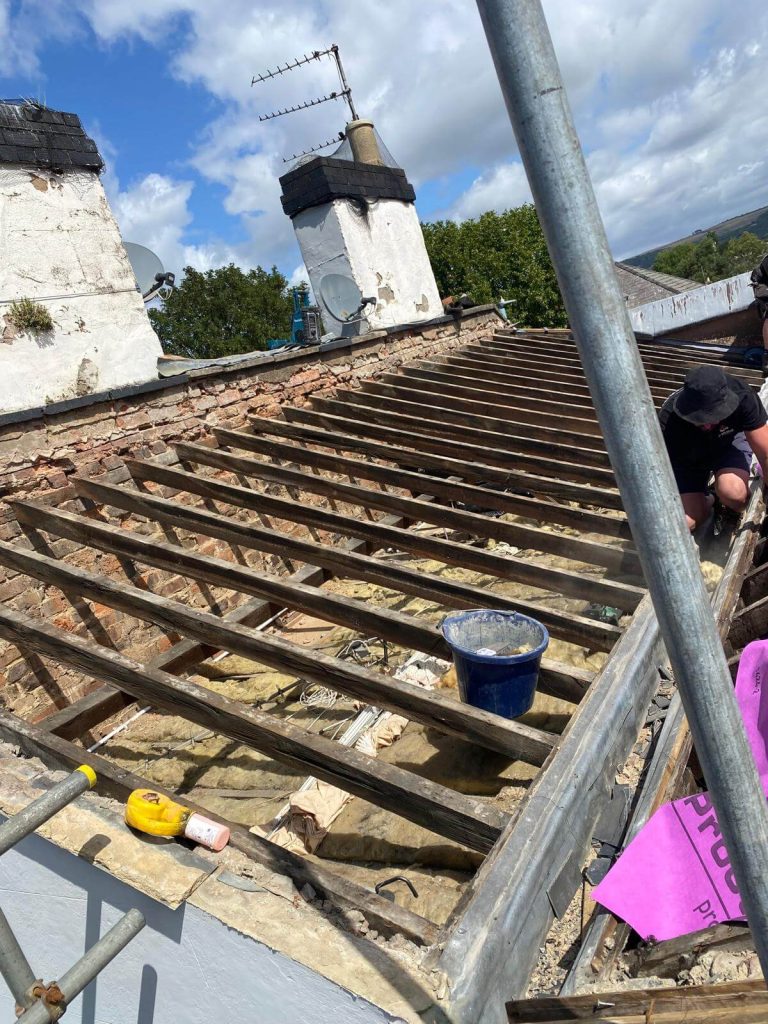 roofer removing old battens